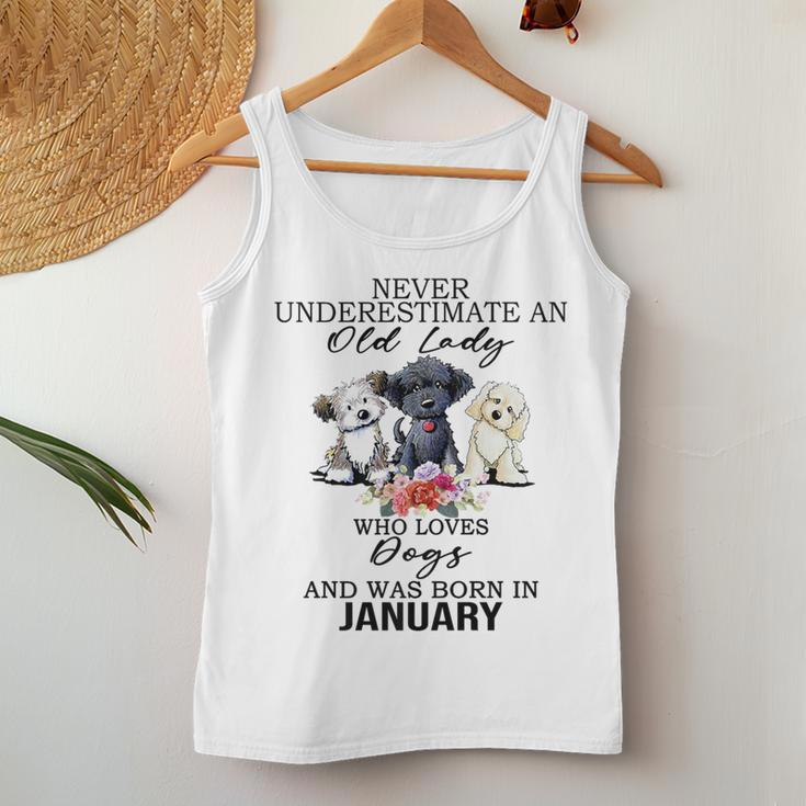 Never Underestimate An Old Lady Who Loves Dogs-January Women Tank Top Unique Gifts