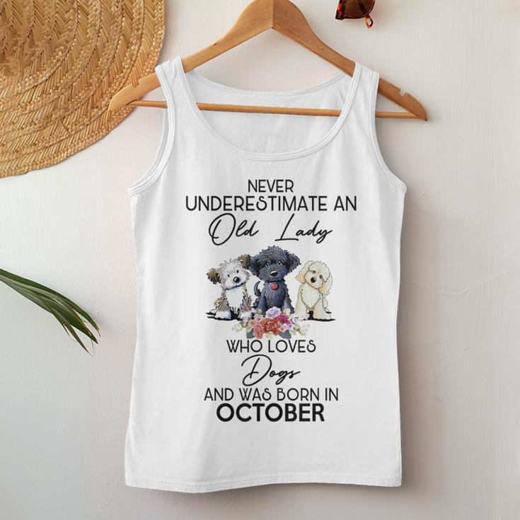 Never Underestimate An Old Lady Who Loves Dogs October Women Tank Top Unique Gifts