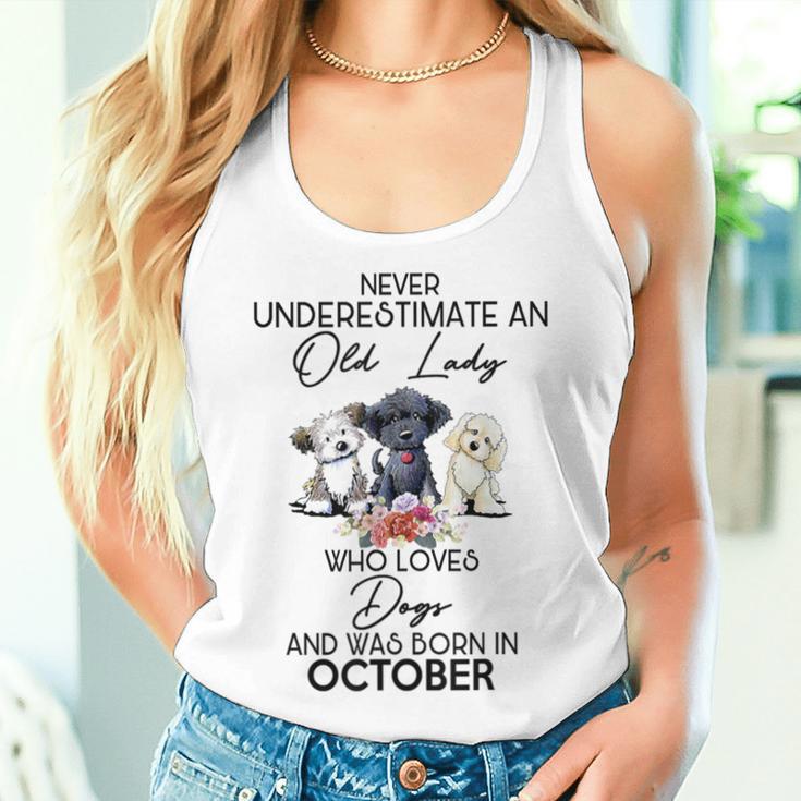 Never Underestimate An Old Lady Who Loves Dogs October Women Tank Top Gifts for Her