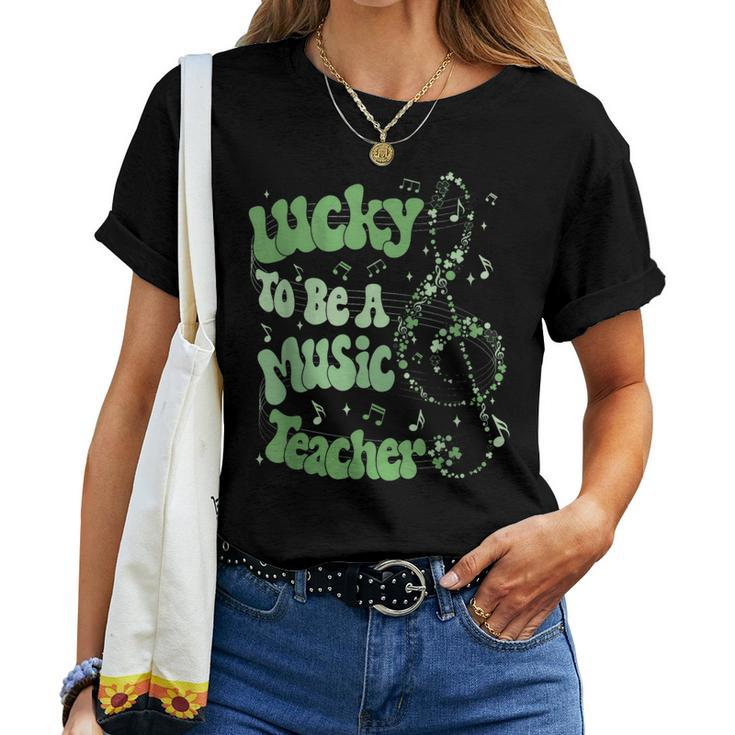 Retro Groovy Lucky To Be A Music Teacher St Patrick's Day Women T-shirt