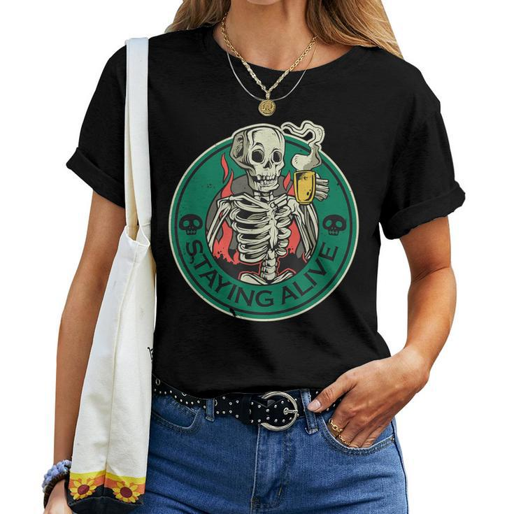 Staying Alive Skeleton Drinking Coffee Skeleton And Coffee Women T-shirt
