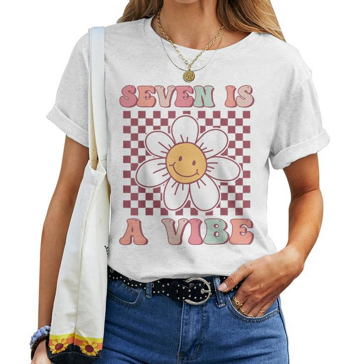 Seven Is A Vibe Cute Groovy 7Th Birthday Party Daisy Flower Women T-shirt