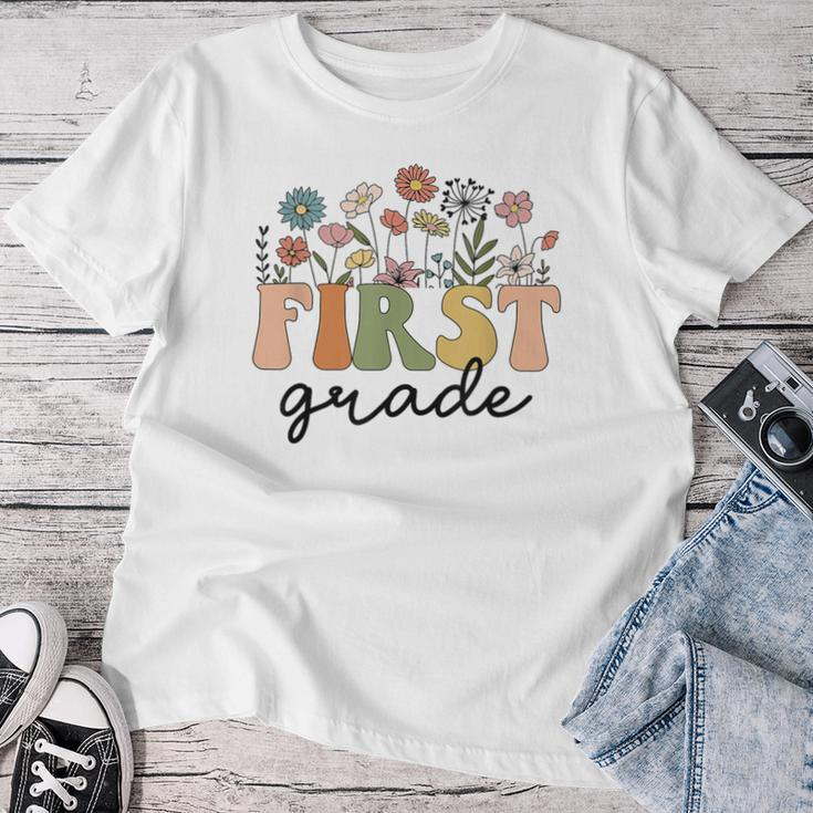 First Grade Teacher Wildflower Back To School Floral Outfits Women T-shirt Funny Gifts