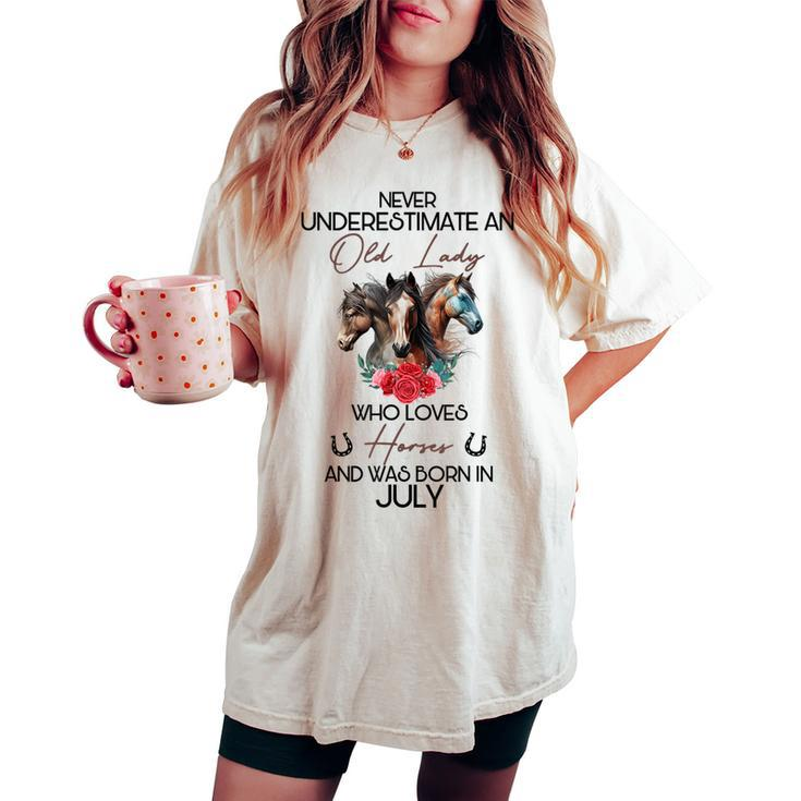Never Underestimate An Old Lady Who Loves Horses July Women's Oversized Comfort T-shirt