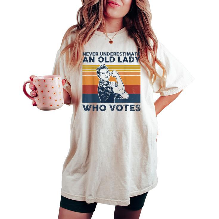 Never Underestimate An Old Lady Who Votes Feminist Women's Oversized Comfort T-shirt