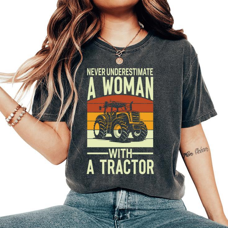 Never Underestimate A Woman With A Tractor Farmer Women's Oversized Comfort T-Shirt