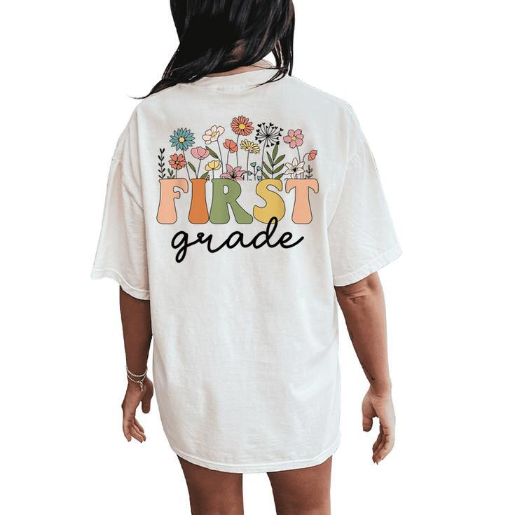 First Grade Teacher Wildflower Back To School Floral Outfits Women's Oversized Comfort T-Shirt Back Print