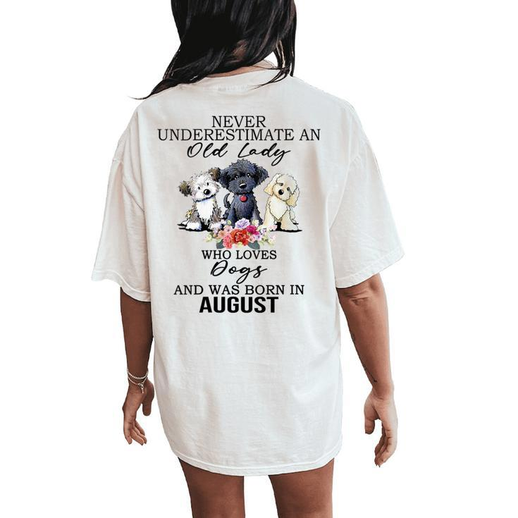 Never Underestimate An Old Lady Who Loves Dogs- August Women's Oversized Comfort T-Shirt Back Print