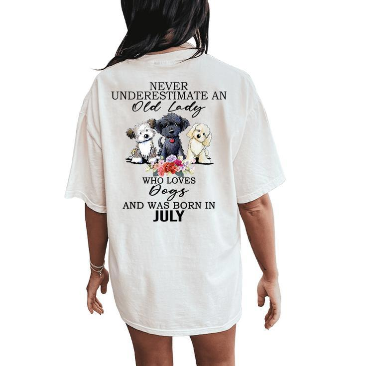 Never Underestimate An Old Lady Who Loves Dogs-July Women's Oversized Comfort T-Shirt Back Print
