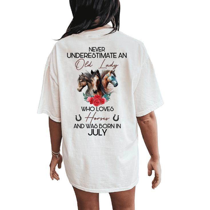 Never Underestimate An Old Lady Who Loves Horses July Women's Oversized Comfort T-Shirt Back Print
