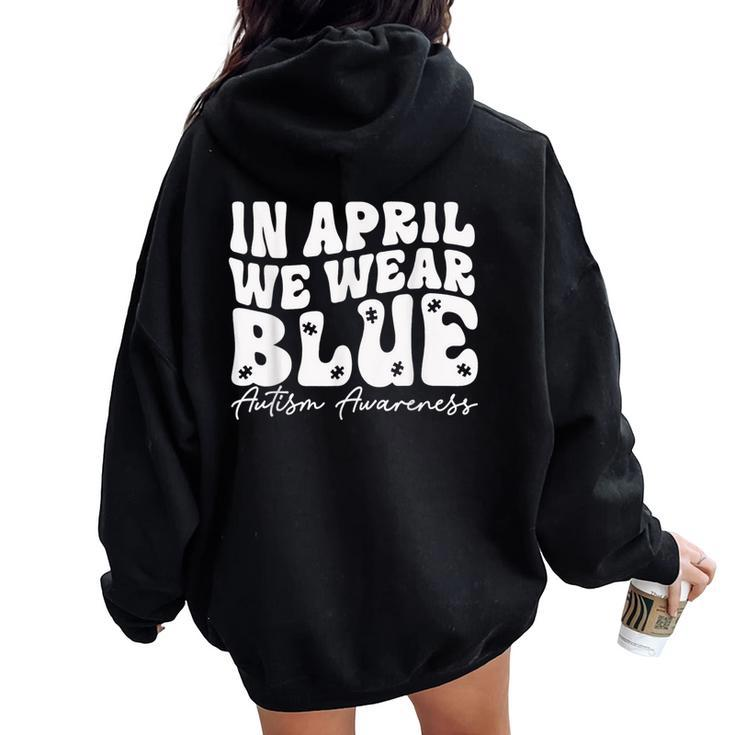 In April We Wear Blue Groovy Autism Awareness Women Oversized Hoodie Back Print