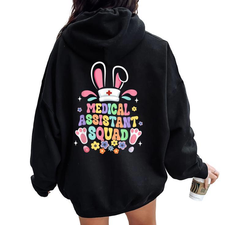 Retro Groovy Medical Assistant Squad Bunny Ear Flower Easter Women Oversized Hoodie Back Print