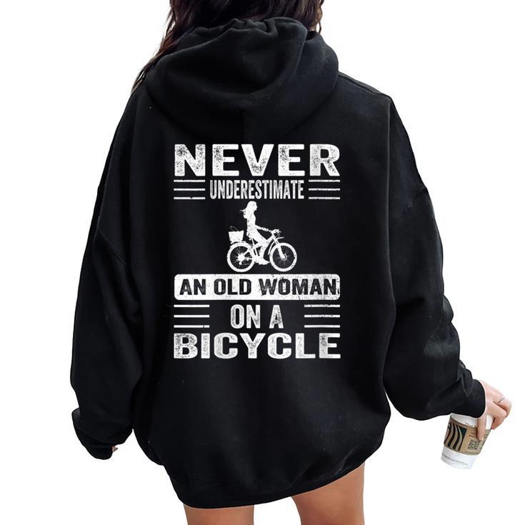 Vintage Never Underestimate An Old Woman On A Bicycle Retro Women Oversized Hoodie Back Print