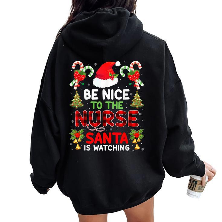 Be Nice To The Nurse Santa Is Watching Red Plaid Christmas Women Oversized Hoodie Back Print