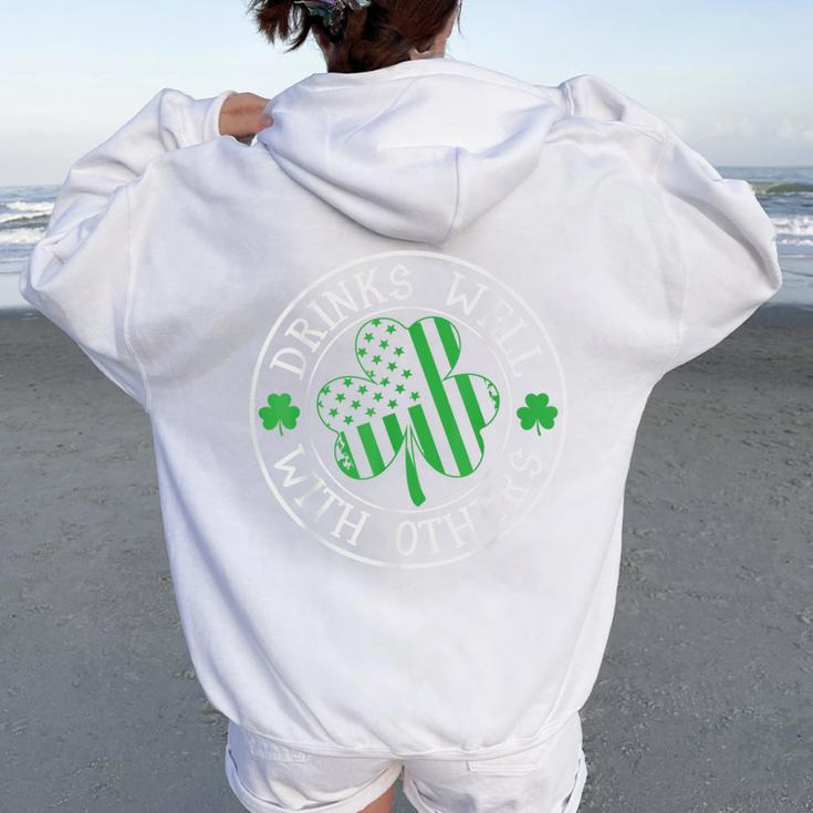Drinks Well With Others St Patrick's Day Drunk Beer Women Oversized Hoodie Back Print