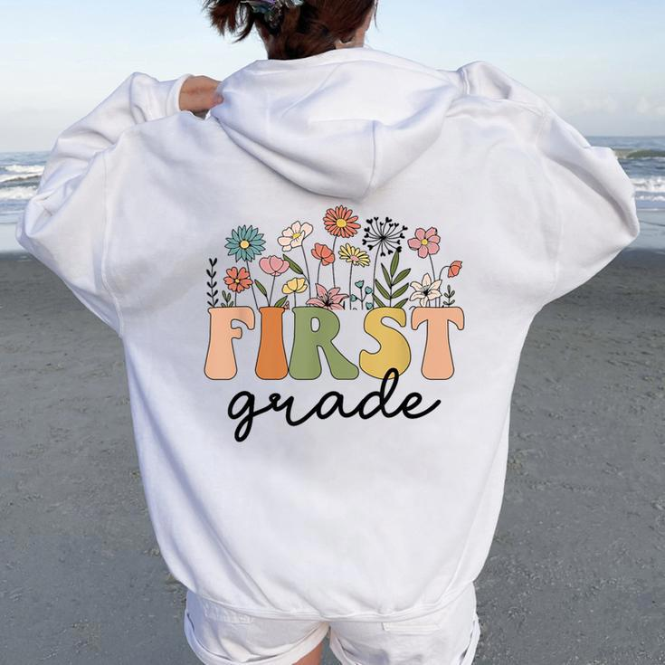 First Grade Teacher Wildflower Back To School Floral Outfits Women Oversized Hoodie Back Print