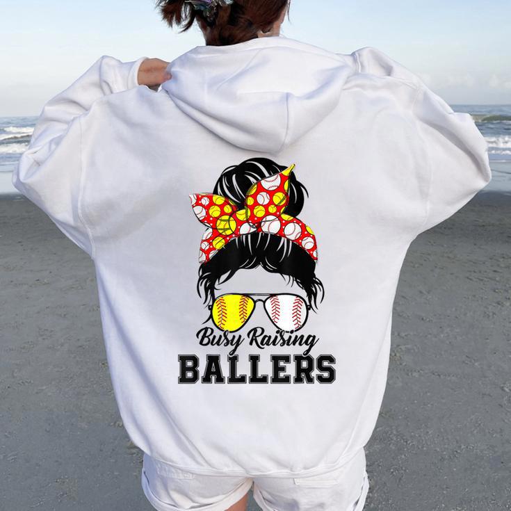 Messy Bun Mom Of Both Baseball Softball Busy Raising Ballers Women Oversized Hoodie Back Print