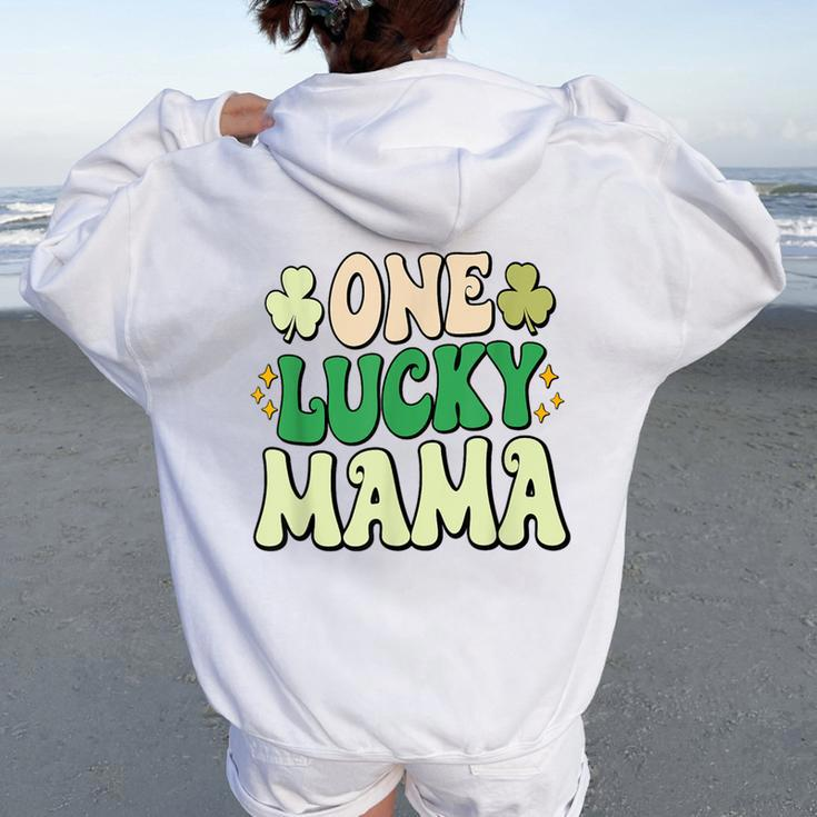 One Lucky Mama Groovy Retro Mama St Patrick's Day Women Oversized Hoodie Back Print