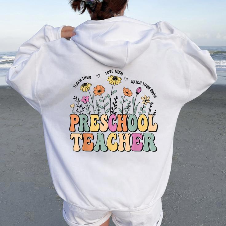 Preschool Teacher Wildflower Groovy Teacher Back To School Women Oversized Hoodie Back Print