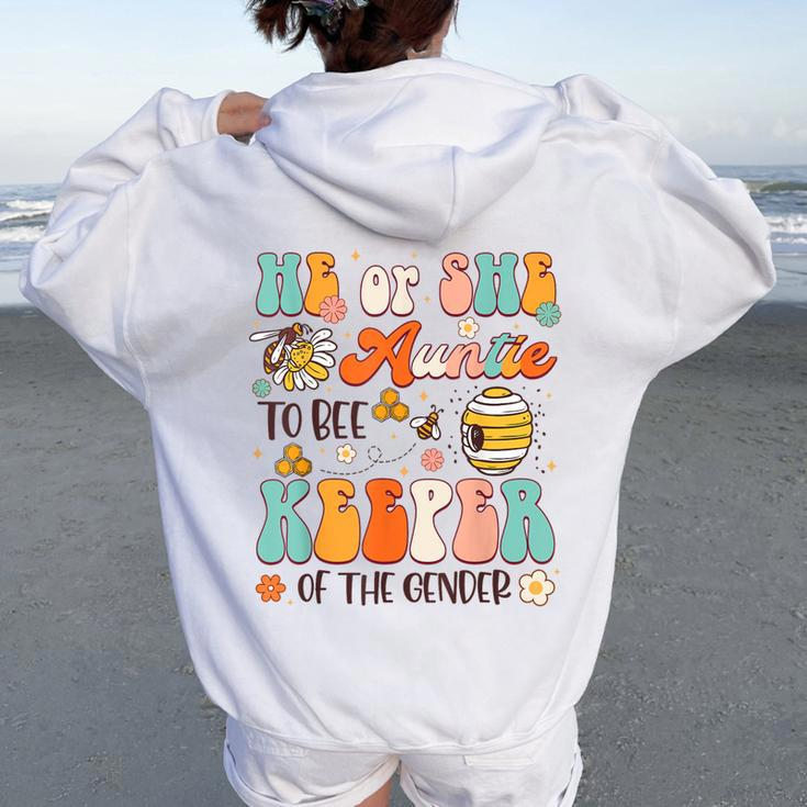 He Or She Auntie To Bee Keeper Of The Gender Reveal Groovy Women Oversized Hoodie Back Print