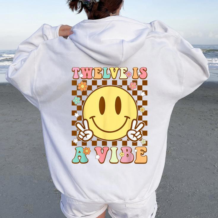 Twelve Is A Vibe 12Th Birthday Groovy 12 Year Old Boys Girls Women Oversized Hoodie Back Print