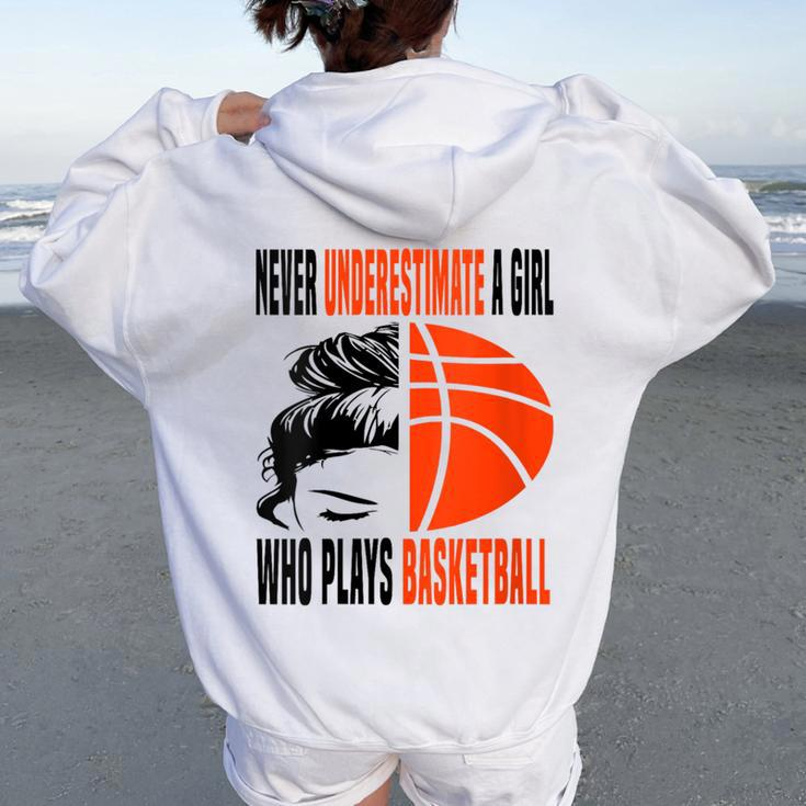Never Underestimate A Girl Who Plays Basketball Messy Bun Women Oversized Hoodie Back Print