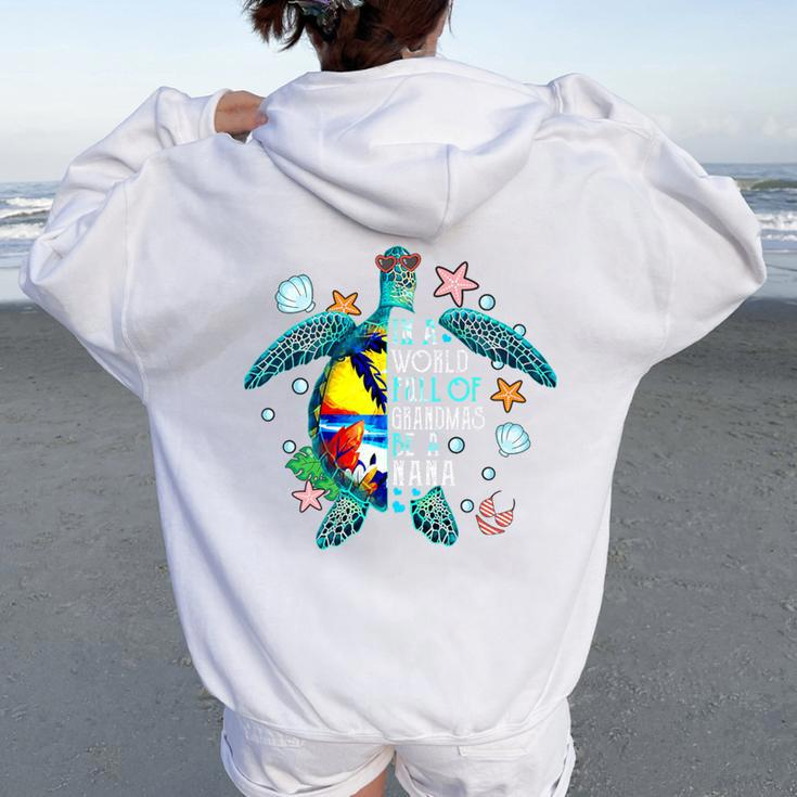 In A World Full Of Grandmas Be A Nana Summer Beach Turtle Women Oversized Hoodie Back Print