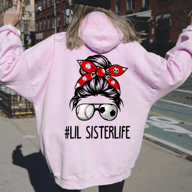 Classy Lil Sister Life Soccer Messy Bun Baseball Game Day Women Oversized Hoodie Back Print Monsterry