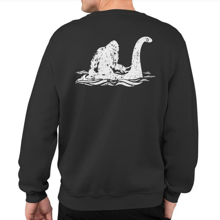 Bigfoot Riding On Nessie Lochness Monster Nessie Yeti Hunter Sweatshirt Back Print