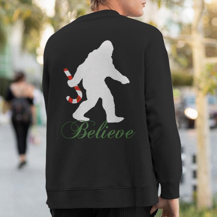 Bigfoot Sasquatch Yeti Believe Candy Cane Christmas Pajamas Sweatshirt Back Print