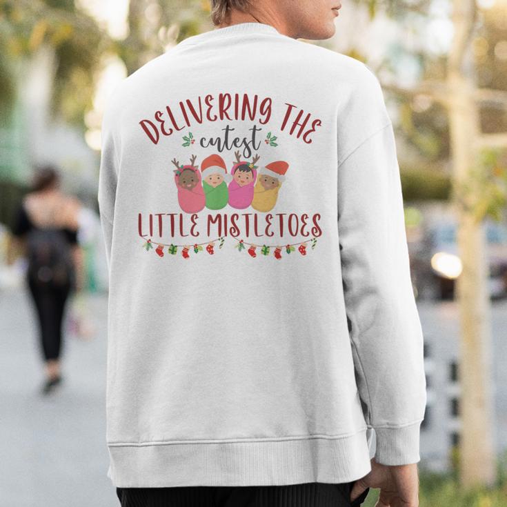 Delivering The Cutest Little Mistletoes Labor Delivery Xmas Sweatshirt Back Print