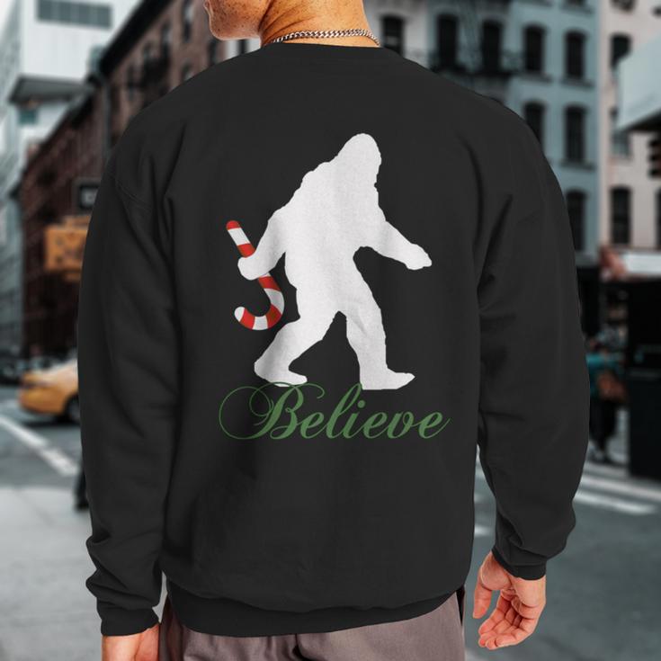 Bigfoot Sasquatch Yeti Believe Candy Cane Christmas Pajamas Sweatshirt Back Print