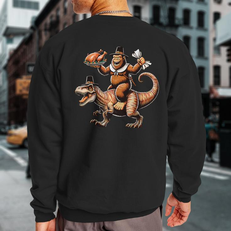 Bigfoot Riding T-Rex Vintage Thanksgiving Turkey Day Sweatshirt Back Print