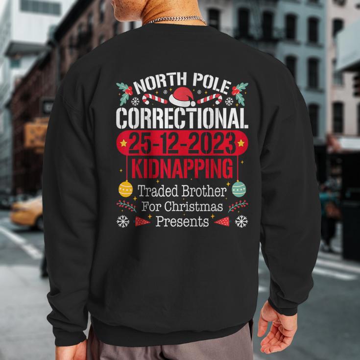 North Pole Correctional Kidnapping Traded Brother Christmas Sweatshirt Back Print