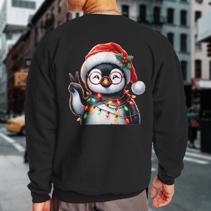 Peace Sign Hand Penguin Santa Christmas Penguin Pajamas Sweatshirt Back Print