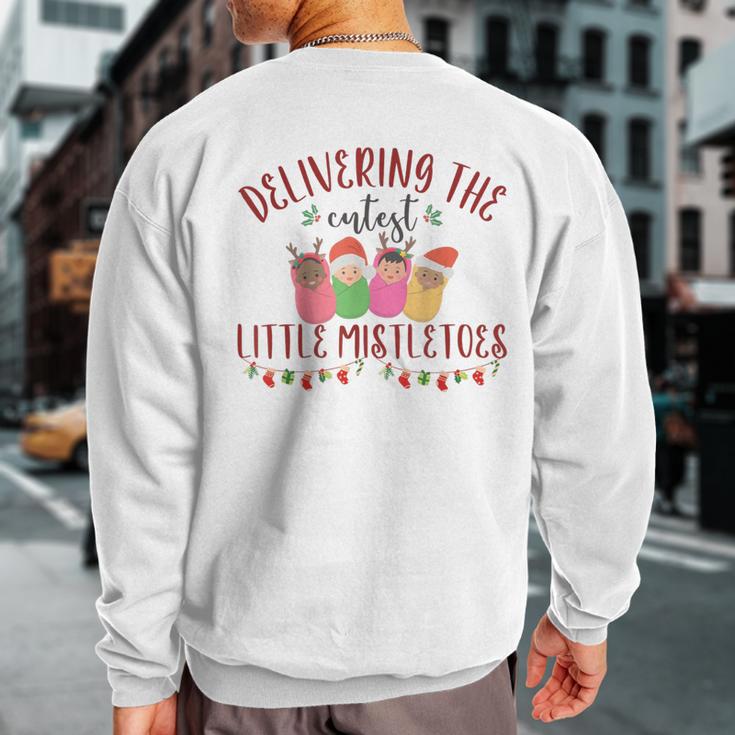 Delivering The Cutest Little Mistletoes Labor Delivery Xmas Sweatshirt Back Print