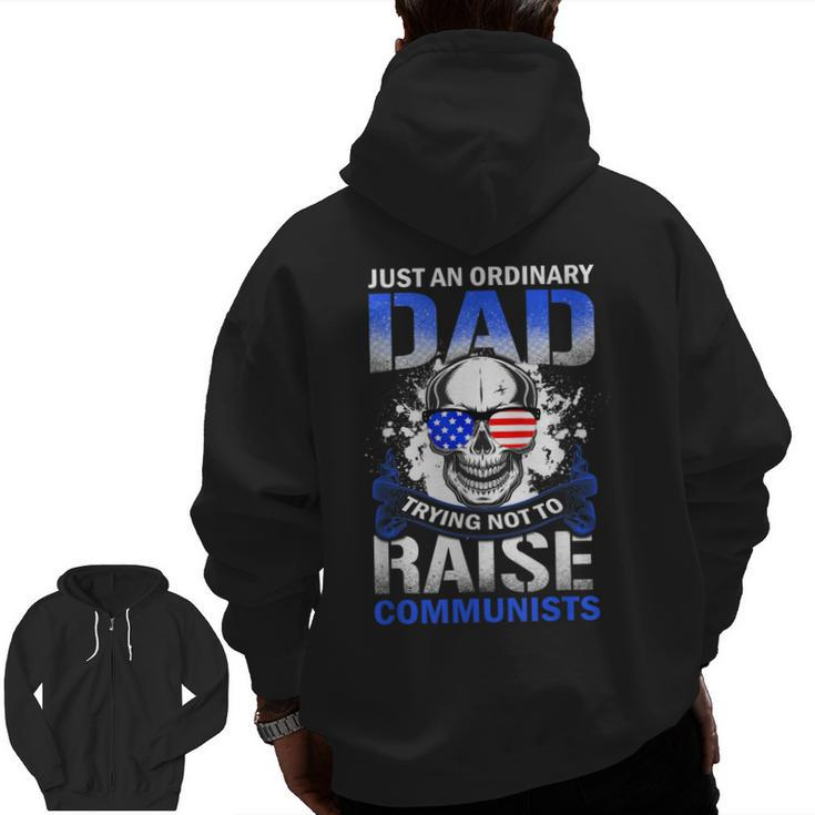 Just An Ordinary Dad Trying Not To Raise Communists Zip Up Hoodie Back Print
