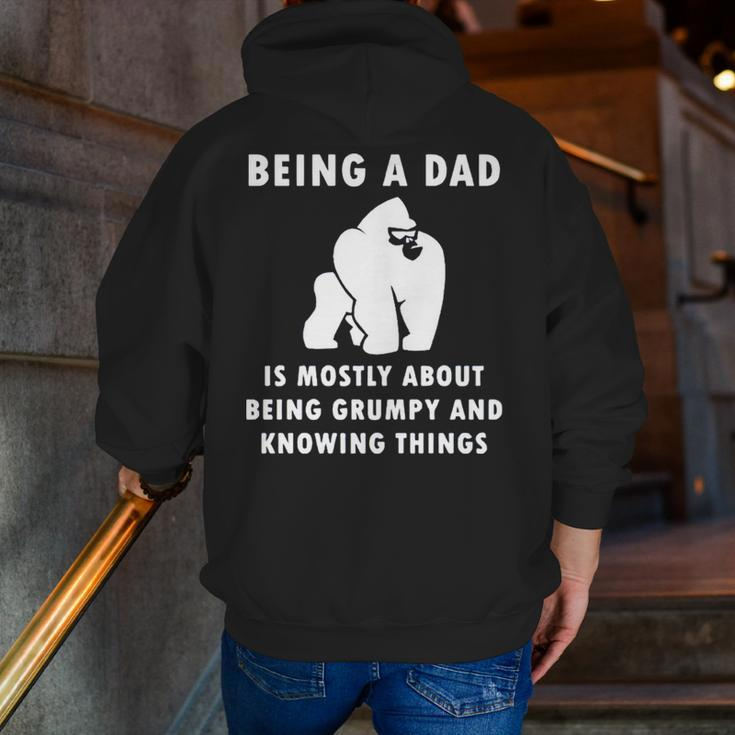 Being A Dad Is Mostly About Being Grumpy And Knowing Things Zip Up Hoodie Back Print