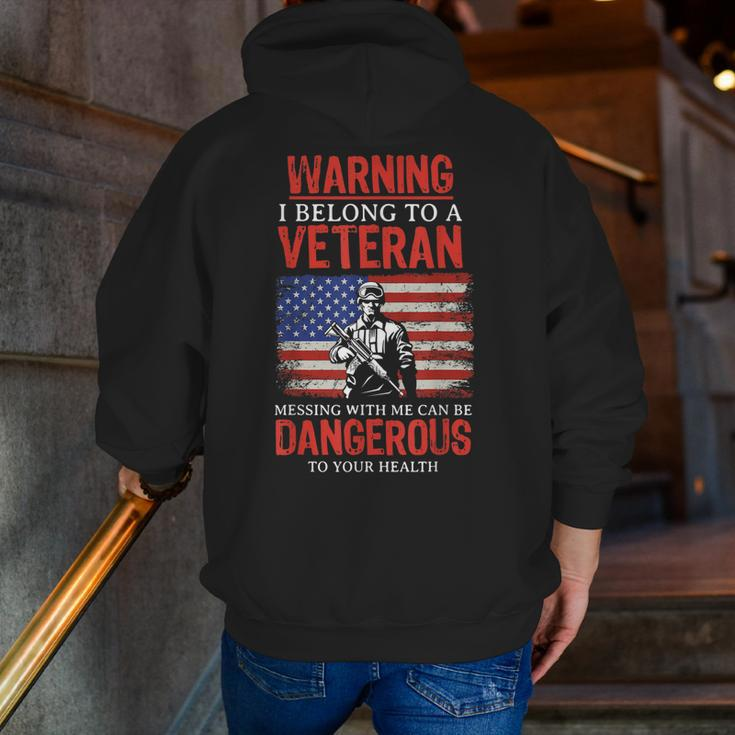 Veteran Wife I Belong To A Veteran Dangerous Warning Zip Up Hoodie Back Print