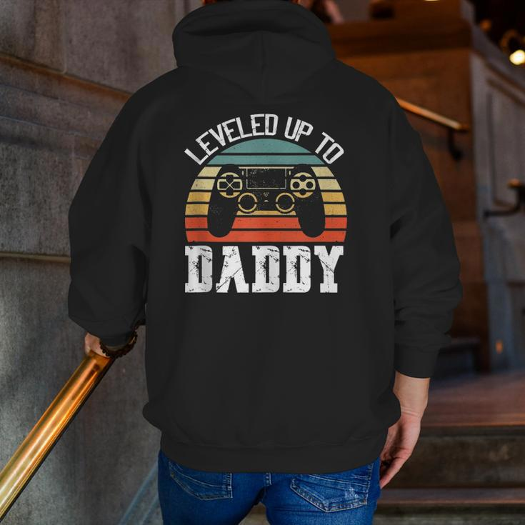 New Dad Father's Day Leveled Up To Daddy Zip Up Hoodie Back Print