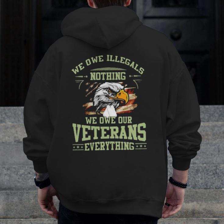 Eagle We Owe Illegals Nothing We Owe Our Veterans Everything American Flag Zip Up Hoodie Back Print