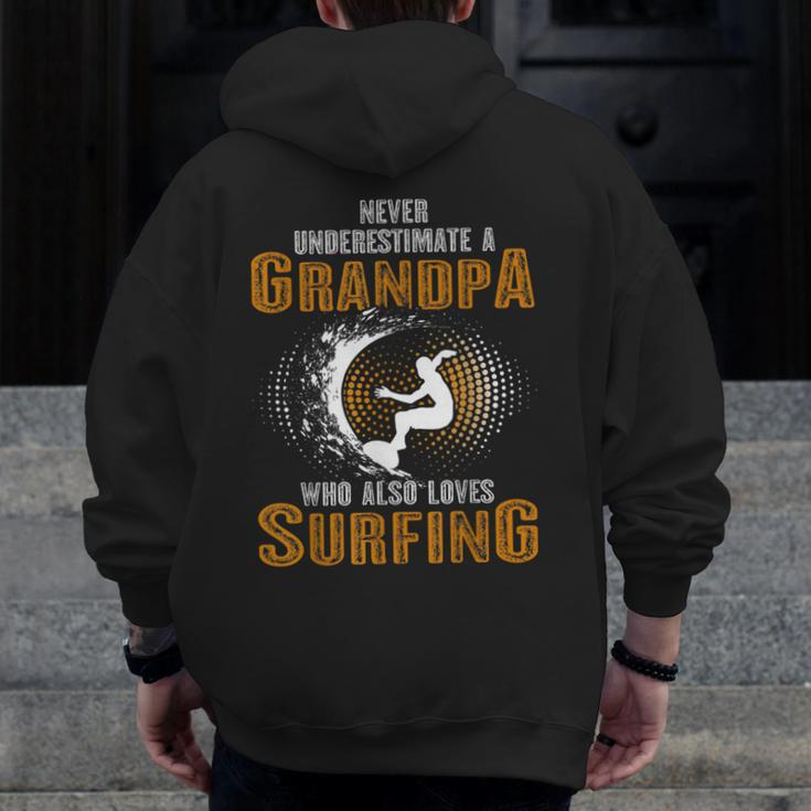 Never Underestimate Grandpa Who Is Also Loves Surfing Zip Up Hoodie Back Print