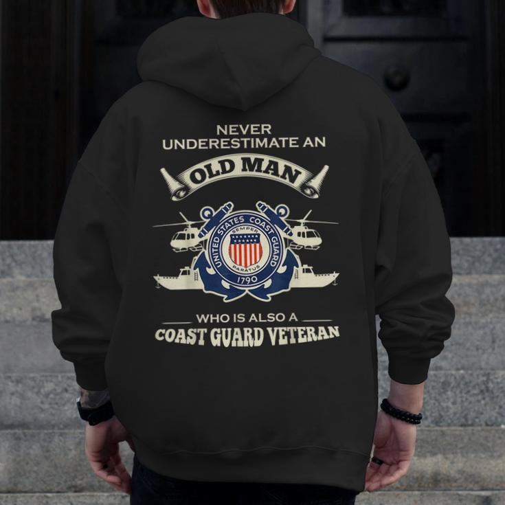 Never Underestimate Us Coast Guard VeteranVeteran Zip Up Hoodie Back Print