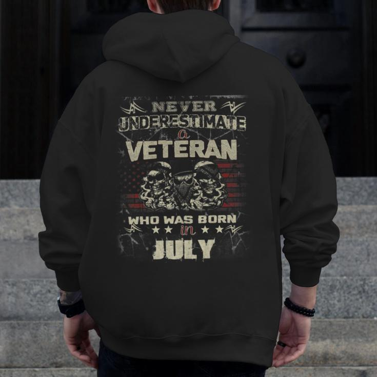 Never Underestimate A Veteran Who Was Born In July Zip Up Hoodie Back Print