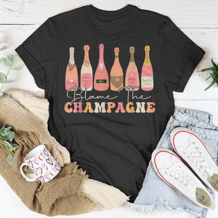 Retro Blame The Champagne Happy New Year 2024 Party Friends T-Shirt Funny Gifts