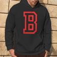 Letter B Large And Bold Outline In Red Hoodie Lifestyle