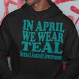 In April We Wear Teal Sexual Assault Awareness Month Groovy Hoodie Unique Gifts