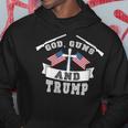 God Guns And Trump Us President Election Donald Trump 2024 Hoodie Unique Gifts