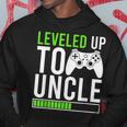 Leveled Up Promoted To Uncle 2024 New Uncle Video Game Hoodie Unique Gifts