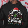 Most Likely To Work On Christmas Family Matching Pajamas Hoodie Funny Gifts